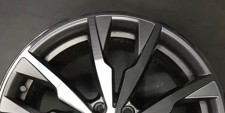 Closeup of a diamond cut alloy wheel after a repair