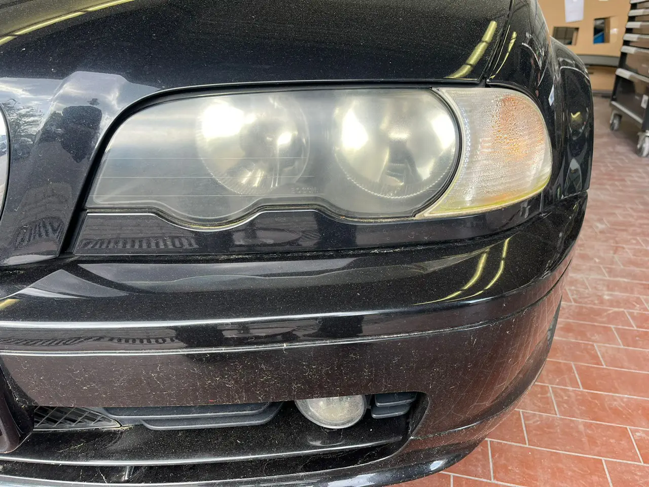 Image of matte headlights that needs restoring.